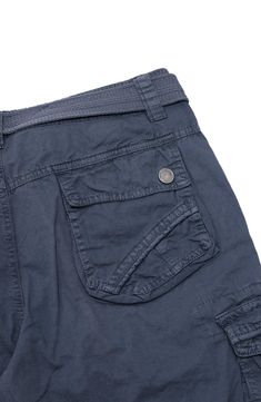 Ideal for everyday wear, these belted cotton cargo shorts deliver casual style with functional utility. 11" rise, 11" inseam (size 32) Belted waist Zip fly with button closure Front slant pockets Back button flap pockets Leg cargo pockets Woven construction Drawstring tie hems 100% cotton Machine wash cold, tumble dry low Imported Model stats: 6'1" height, 32" waist. Model is wearing size 32. Utility Cargo Shorts With Belt Loops For Outdoor, Cargo Shorts With Belt Loops For Outdoor Activities, Bermuda Cotton Cargo Shorts With Belt Loops, Casual Cargo Shorts For Outdoor With Belt Loops, Short Cotton Cargo Pants With Belt Loops, Outdoor Cotton Shorts With Belt Loops, Cotton Shorts With Belt Loops For Outdoor Activities, Chic Over 50, Pocket Detail