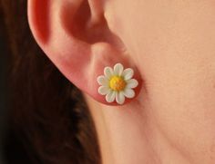 Minimalist stud earrings with white handmade daisies. Material of flowers -polymer clay. Polymer clay isn't afraid of water, strong, flexible but these delicate flowers may break if drop or bent. Treat these earrings gently just as you would any other piece of jewelry! Store in a clean, dry place. Material of posts - silver plated copper Gorgeous gift for women as handmade item and delicate summer accessory. Sizes- dia of flower 15 mm/ 0,6 inch DAISY NECKLACE - https://www.etsy.com/listing/10238 Hypoallergenic Flower-shaped Polymer Clay Jewelry, Trendy 3d Flower Jewelry, Trendy White Flower Earrings For Gift, Trendy White Flower Earrings As Gift, White Daisy-shaped Hypoallergenic Flower Earrings, Cute Daisy Shaped Flower Earrings For Gifts, Cute Daisy Flower Earrings For Gift, Trendy White Daisy Shaped Jewelry, Trendy White Daisy-shaped Jewelry