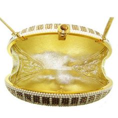 "Heart- stoppingly beautiful design and sparkle! These Evening Formal Oval shaped Purses in gold, gold with pearls and ALL CLEAR will be the talk of town!! Each is handmade. Each takes months to complete, one crystals at a time! Here at Etsy, we offer you the best quality at discounted prices, a fraction of what high priced retailers charge! These are evening bags that are fully covered in genuine, very fine, small sized Swarovski Crystals from Austria! One purse is in all CLEAR CRYSTALS, One is Luxury Bedazzled Jewelry For Party, Luxury Bedazzled Party Jewelry, Elegant Bedazzled Formal Jewelry, Luxury Openable Clutch For Wedding, Elegant Formal Bedazzled Jewelry, Gold Crystal Evening Bag For Wedding, Designer Gold Handheld Evening Bag, Gold Crystal Evening Bag With Bling, Luxury Embellished Crystal Evening Bag