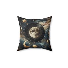 a pillow with an image of the moon and stars on it