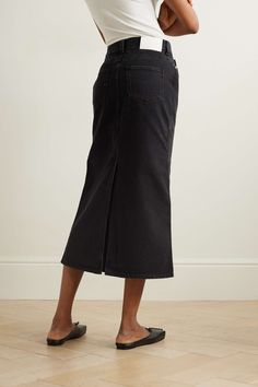 Find LOULOU STUDIO Net Sustain Rona Organic Denim Midi Skirt on Editorialist. LOULOU STUDIO's collections are packed with styles that you'll spot tastemakers wearing on the streets of Paris. Made from organic cotton, this denim skirt has a '90s-inspired midi length. Pair it with sneakers, knee boots or ballet flats. This product was created using Considered Materials. Find out more about NET SUSTAIN here. High Rise Relaxed Denim Skirt For Workwear, Denim Straight Leg Skirt For Work, Workwear Straight Leg Denim Skirt, High-waist Denim Skirt For Work, High Rise Skirt For Fall Workwear, High Rise Skirt For Workwear, Fall Season, Relaxed Fit High Waist Denim Skirt For Work, Full Length Cotton Skirt For Work, Long Denim Skirt With Pockets For Work