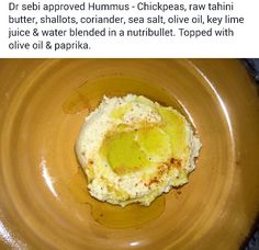 a brown plate topped with food on top of a table