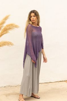 Eggplant purple sheer poncho to wear as a boho chic multiple way dress cover up. Perfect as an off the shoulder knitted poncho for a boheme style. Its simplicity and versatile design gives this poncho many possibilities, whether you want to wear it as a shawl, cape, scarf, dress cover up or even as shrug. The perfect accessory for spring days or those cool summer nights, adding a pop of color to a simple tank top and jeans outfit or even to a wedding garment. The poncho is made of soft, light an Cheap Women's Shawl Poncho, Lightweight Dress Cover Up, Luxury Chic Poncho For Spring, Boho Dress With Scarf, Poncho From Shawl, Scarf As A Poncho, Poncho Outfit Summer, Sheer Poncho, Poncho For Women