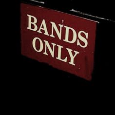 a red and white sign that says bands only