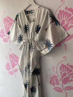 "BohoRobes Palm Tree Printed Kaftan Dress, Beach Cover Gown, Nightwear Dress, Long Caftan For Women, Boho Maxi Dress Size - Free Size Length - 44/ 48/ 52 Inches Bust/chest size - 120 CM/ 48 Inches Fabric - 100% Cotton Pattern - Palm Tree Print Kaftan has Adjustable Drawstring Waist to loose or tight , Kaftan has V Shape Neck Which is 8\" Inches Deep. Kaftan Is Multi-purpose and can be worn as a cover up at the Beach ,Lounge wear ,sleepwear ,Pregnant Women Hospital Gown for Newly Moms ,Maxi Dress ,Free Dress etc . This kaftan, made from incredibly soft and lightweight cotton, is versatile for many occasions. Perfect for a swimsuit cover up on the beach or by the pool, with shorts and a tank top or over a summer dress. Can be also worn with a glam belt for a more dressed up look for lunch. I Summer Dresses With Kimono Sleeves In White, White Summer Dresses With Kimono Sleeves, White Summer Dress With Kimono Sleeves, Printed Beachwear Dress For Brunch, Summer Cotton Dresses With Kimono Sleeves, Cotton Summer Dresses With Kimono Sleeves, Printed Vacation Dress With Kimono Sleeves, Printed Dress With Kimono Sleeves For Vacation, Tropical Printed Dress For Festival