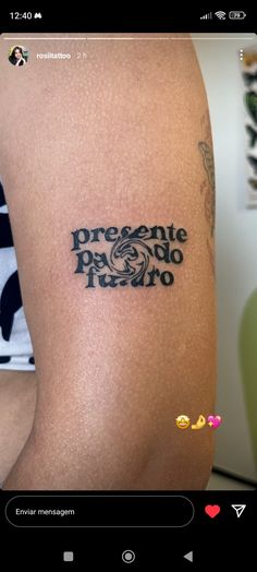 the back of a woman's arm with tattoos on it and words written in spanish