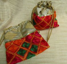 Phulkari gift bags for any occasion at any time. Made from chiffon fabric with phulkari embroidery and golden string, they are very bright and beautiful in look. Perfect for putting gift items like chocolates, dry fruits, etc, For putting return gifts, for marriages, festivals, and functions, they are multi-purpose bags. Can be used as jewelry bags. These bags are multicolored, handmade. Size - range from 7 x 6 inches to 8 x 6 inches. For more such bags please visit- https://www.etsy.com/in-en/s Multicolor Bags For Diwali Celebration, Multicolor Pouch Potli Bag For Daily Use, Rectangular Potli Bag With Multicolor Embroidery For Festivals, Red Rectangular Potli Bag For Festivals, Multicolor Embroidered Bag For Festival Gifts, Multicolor Embroidered Bag For Festivals, Multicolor Celebration Bags For Diwali, Bollywood Style Multicolor Festive Bags, Traditional Potli Pouch Bag For Daily Use