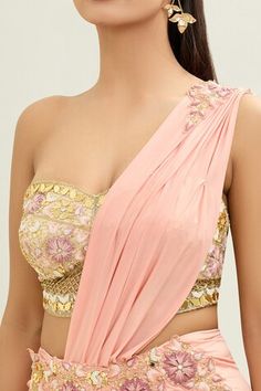 Peach pre-draped saree with thread and acrylic embroidery. Paired with an embroidered padded blouse with mesh detailing. - Aza Fashions Draped Blouse With Zari Work For Wedding, Wedding Blouse With Resham Embroidery And Draped Shape, Wedding Blouse With Draped Resham Embroidery, Draped Wedding Blouse With Zari Work, Draped Wedding Blouse With Resham Embroidery, Pre-draped Saree With Zari Work, Pre-draped Blouse Piece With Zari Work For Reception, Pre-draped Lehenga For Wedding, Draped Blouse Piece For Wedding And Festivals