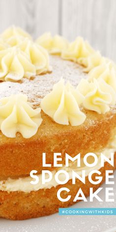 a lemon sponge cake on a white plate with the words lemon sponge cake over it