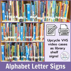 the alphabet letter signs are in front of a bookshelf filled with children's books