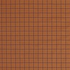 an orange and brown plaid fabric