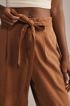 100% Tencel Side slant pockets Tie belt Front zip Machine wash Imported | Ruffle-Waist Wide-Leg Pants by Cloth & Stone in Brown, Women's, Size: XS, Tencel at Anthropologie Chic Straight Leg Bottoms With Tie Waist, High Waist Belted Versatile Pants, Fall Trousers With Tie Waist, Versatile High Waist Belted Pants, Belted Bottoms For Business Casual Summer, Versatile High Waist Belted Bottoms, High Waist Tie Waist Bottoms, Versatile Belted Trousers, Chic Paperbag Waist Bottoms With Tie