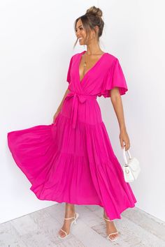 Barker Dress - Pink - Petal & Pup USA V-neck Midi Dress With Tie Waist For Vacation, Chic Spring V-neck Wrap Dress, Summer Short Sleeve V-neck Dress With Tie Waist, Chic V-neck Midi Dress With Tie Fastening, Summer Midi V-neck Dress With Tie Waist, Belted V-neck Summer Dress, Flowy Belted Wrap Dress, Chic V-neck Wrap Dress With Ruffles, Flowy Summer V-neck Dress With Tie Waist