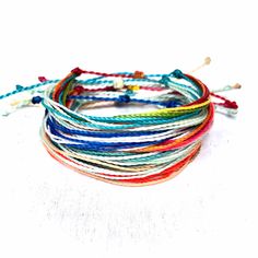 multicolored bracelets on white background