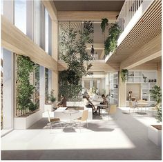 an office building with people sitting at tables and plants hanging from the ceiling above them