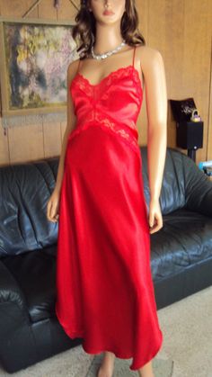 This is a vintage 60's JENELLE OF CALIFORNIA Red Wet Looking Satin polyester & Laced Long Tall  Nightgown Size Large. The nightgown is tagged a size Large & is in very good vintage condition.  It does have a few pulls on it but they don't take away from it's beauty & value .  The nightgown comes with a non adjustable shoulder straps ( see pic ) , Lower side splits ( see pic ) , laced front V neck & under bust, arm openings & upper low back areas all ( see pics ) & a full hem. BUST 38 - 40 With f Red Sleeveless Sleepwear For Wedding Night, Red Lace Trim Nightgown, Red V-neck Nightgown For Wedding Night, Red Fitted Dress For Wedding Night, Fitted Red Dress For Wedding Night, Red Fitted Nightgown For Sleep, Fitted Red Nightgown For Parties, Fitted Red Nightgown For Sleep, Red Fitted Party Nightgown