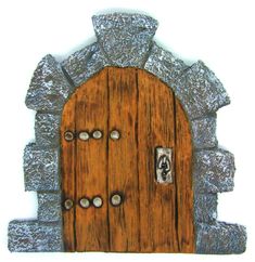 an image of a wooden door that is made out of metal and wood planks