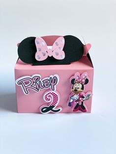 a pink box with minnie mouse on it