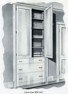 an old black and white photo of a cabinet with linens in it's doors