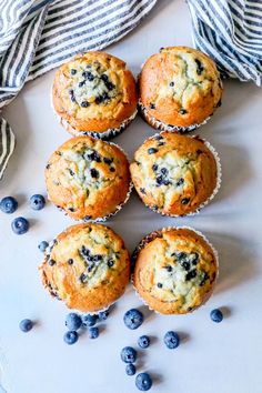 blueberry muffins with fresh blueberries on the side