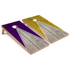 two wooden boards with purple and yellow designs on the top, one has a hole in it