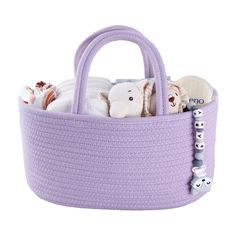 a purple basket with stuffed animals in it