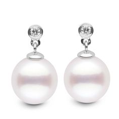 These beautiful earrings feature large, flawlessly round, white South Sea pearls dangling elegantly from solid, 14-karat gold and 0.10 total carat weight of diamonds. Made with our lustrous, AAA-quality white South Sea 10.0-11.0 mm pearls. Pearl Diamond Dangle Earrings, Pearl Diamond Earrings, Pearl Oyster, Black Pearl Earrings, Gold Lips, Golden South Sea Pearls, Jewelry Appraisal, Pearl And Diamond Earrings, Diamond Dangle Earrings