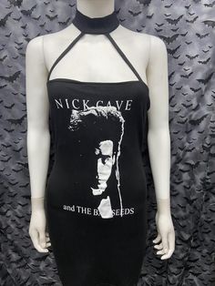 This is a Nick Cave and the Bad Seeds screen printed sleeveless strappy collared dress. This has the Nick Cave image screen printed on the front. 92% Rayon/ 8% spandexThese are handmade screenprinted and slightly vary from the photo. Please feel free to email me any questions. Thanks for looking.Due to an influx of incorrect addresses if a package is returned,  you must pay the shipping cost to resend the item to you.I do not do exchanges and I do not take returns unless the item is damaged. I t Cave Images, Clothes Stickers, Pink Leather Jacket, Black Cropped Tank, Black Crop Top Tank, The Bad Seed, Nick Cave, Collared Dress, Boarding School