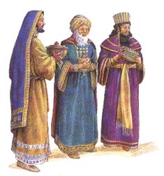 three men dressed in colorful clothing standing next to each other