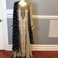 Beautiful Ready Made 2 Piece Gown Style Pakistani Outfit. This Dress Come With A Scarf/Dupatta To Style With. Size M. Please Contact Do Measurements And Questions. Open To Reasonable Offers. *Outfit Has Some Thread Pulling. Desi Gown, 2 Piece Gown, Thread Pulling, Gown Style, Ready Made, Black Tan, Black And Tan, 2 Piece, Desi