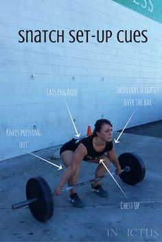 a woman squats with the words snatch set - up cues above her head and behind her back