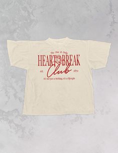 Join the Heart Break Club in our Tennis Club inspired varsity, oversized t-shirt, perfect for Valentine's Day & every day after. - Features the phrase "Heart Break Club" with an angel in the center and the phrase "the one & only" above & "it's not just a holiday, it's a lifestyle" underneath all in a red ink across the front - Screen print transfer that is heat pressed onto each tshirt - Tshirt is a high quality, garment dyed, vintage wash that gets softer after each wash - Oversized fit - Sizing translation: XS/S - L , S/M - XL , L/XL - 2XL , 2XL/3XL - 3XL - 100% Cotton **due to screens & filters color may vary from pictures** Committee Tshirt Design, Wedding Merch Tshirt, Varsity Tshirt Design Ideas, Screen Print Shirt Designs, Conference Tshirt Design, Edgy T Shirt Design, Vintage Merch Design, Merch Shirt Design, Choir Tshirts Design