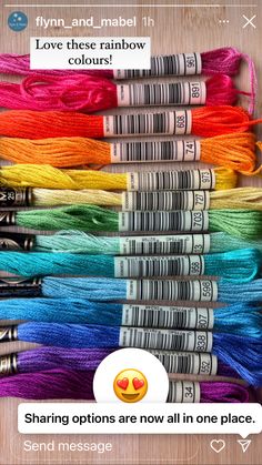 many different colored yarns are arranged in rows on a table with the caption love these rainbow colours