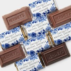 six hershey's chocolate bars with blue flowers on them