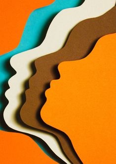 an orange, blue and white paper cut out of the shape of people's heads