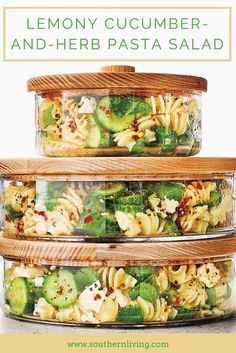 three glass containers filled with pasta and vegetables