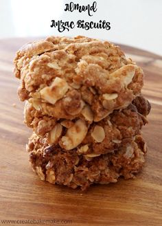 three oatmeal cookies stacked on top of each other with the words almond rye biscuits