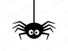 a black and white spider hanging from the ceiling with eyes on it's head