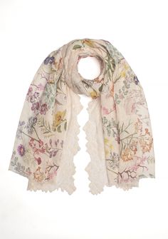 Step into a floral garden with this exquisite linen printed scarf adorned with a captivating beige bold leaf lace. Crafted from breathable linen fabric, it offers a refreshing and comfortable feel. The exquisite bold leaf lace pattern adds an element of sophistication, making it a statement accessory. This versatile scarf effortlessly enhances both casual and formal outfits. Beige Floral Print Scarves For Spring, Beige Floral Print Scarf For Spring, Cream Floral Print Scarves For Spring, Bohemian Beige Scarves For Spring, Bohemian Beige Scarf For Spring, Bohemian Linen Scarves For Spring, Linen Scarf, Linen Scarves, Printed Scarf