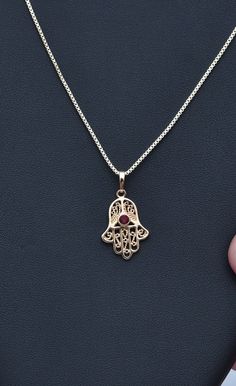 Hamsa Necklace Lucky Hamsa Necklace Gold Hamsa Necklace Inlaid Red Gemstone Fine Ruby Stone Necklace Fatima Hand Chain Spiritual Necklace Filigree Work Filigree Jewelry Gold Fatima Hand Jewelry Hamsa Jewelry Ruby stone jewelry Hamsa necklace made of high quality 21K gold filled A gift for a woman A gift for Valentine's Day A gift for an anniversary A gift for her A gift for a mother Spiritual Red Round Pendant Jewelry, Spiritual Red Pendant Necklace, Red Spiritual Round Pendant Jewelry, Red Birthstone Necklace For Weddings, Red Wedding Necklace With Birthstone, Traditional Red Necklaces With Jewels, Traditional Red Necklace With Jewels, Red Gemstone Pendant Necklaces, Red Gemstone Pendant Necklace