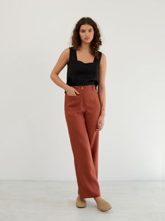 JOEL are straight-leg linen pants with a relaxed fit. They feature a button and zip closure, elastic at the back, and two large front patch pockets. DETAILS - High Waist - Straight Leg Silhouette - Two large patch pockets on the front - Elastic back waistband for comfort and fit - Button and concealed zip closure at the front COLOR - Rust (featured color) - Multiple colors available in dropdown menu above - See all color options & order fabric samples here: https://www.etsy.com/listing/586569696 Fitted Linen Versatile Pants, High-waisted Linen Cargo Pants For Work, Brown Linen Tapered Leg Bottoms, Linen Wide-leg Pants For Fall, Wide-leg Linen Bottoms For Fall, Brown Linen Tapered Leg Pants, High Waist Linen Bottoms For Fall, Fall Linen Wide-leg Pants, Brown Linen Straight Leg Bottoms