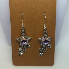 These Earrings Are On Sterling Silver Hooks. Party Earrings With Star Charm In Metal, Party Metal Earrings With Star Charm, Party Earrings With Star Charm, Silver Star Shaped Metal Jewelry, Star Shaped Silver Metal Jewelry, Silver Star-shaped Metal Jewelry, Elegant Silver Earrings With Star Charm, Silver Star Charm Earrings For Party, Silver Star Charm Crystal Earrings For Gift