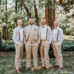 a group of men standing next to each other