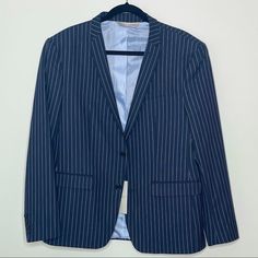 Brand New With Tags - Zara Men’s Navy Pinstripe Suit Jacket - Two Button Closure - Vent In The Back - Size 44 Us - Dry Clean Only Approximate Measurements: Pit To Pit- 21” Pit To Pit With Stretch- 23 1/2” Sleeve Length- 17 1/2 Business Striped Sport Coat With Welt Pockets, Striped Sport Coat With Welt Pockets For Business, Spring Striped Business Suits, Spring Striped Suits, Fitted Striped Sport Coat For Business Casual, Striped Fitted Sport Coat With Long Sleeves, Zara Fitted Blazer For Business, Navy Pinstripe Suit, Blue Sport Coat