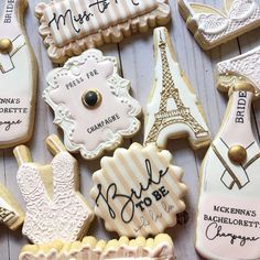 some decorated cookies are sitting on a table