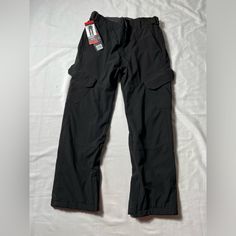 Nwt Gerry Black Cargo Snow Pants Men’s Size M Black Utility Work Pants With Functional Pockets, Black Straight Leg Bottoms With Functional Pockets, Black Pants With Functional Pockets For Outdoor Activities, Black Pants With Hip Pockets For Outdoor Activities, Black Utility Bottoms For Outdoor Activities, Outdoor Black Work Pants With Hip Pockets, Functional Black Pants With Belt Loops, Functional Black Work Pants For Outdoor, Outdoor Black Bottoms With Belt Loops