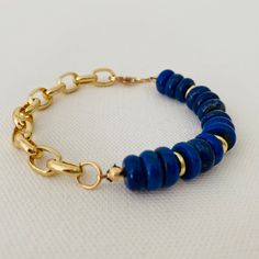 Gold, Bold, Chain Link, Lapis, Versatile, Navy Blue, Bracelet Blue Adjustable Chain Bracelet For Everyday, Everyday Blue Bracelet With Adjustable Chain, Bold Adjustable Gold Jewelry, Bold Gold Bracelets For Gifts, Bold Gold Bracelets For Gift, Gold Beaded Lapis Lazuli Bracelets, Adjustable Blue Chain Bracelet, Gold Lapis Lazuli Beaded Bracelets With Round Beads, Everyday Blue Bracelets With Gold Beads