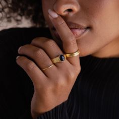 When you have an event coming up and need to find something quick to accessorize with, our Celestial Black Vintage Wavy Signet Ring is the one to reach for. The deep, Midnight Blue Sandstone is dimensional and adds a slight shimmer to the ring while the engraved band adds even more interested to this statement jewelry piece. No need to wear anything else to receive endless compliments on your glamorous ensemble. Material: High Quality Solid 925 Sterling Silver Finish: 18K Gold Featuring a ~5mm E Black Signet Ring, Initial Tag Necklace, Moon Phase Ring, Vintage Celestial, Dainty Initial Necklace, Blue Sandstone, Baguette Ring, Stacking Ring Set, 18k Gold Ring