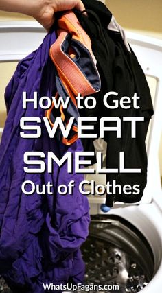 a person is holding clothes in front of a washer with the words how to get sweat smell out of clothes