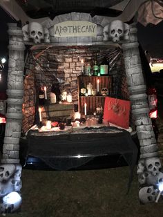 an outdoor display with skulls and candles